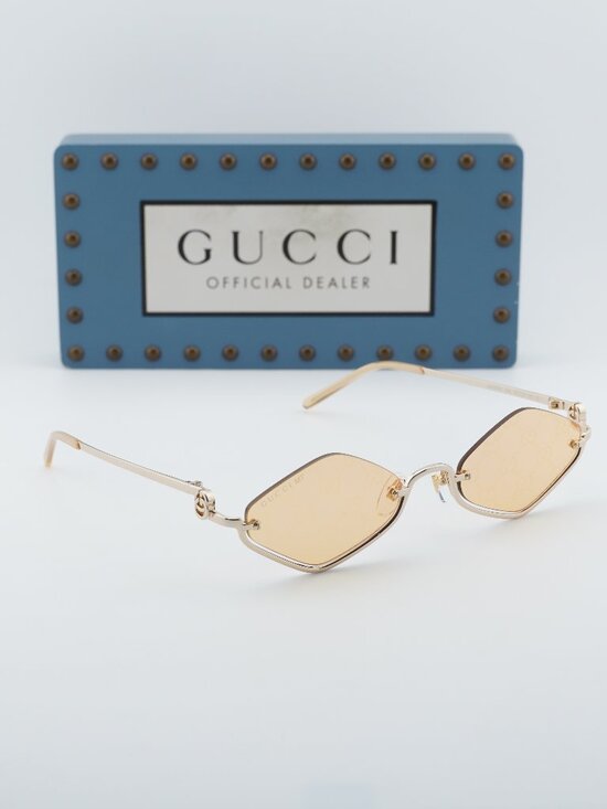 Gucci GG1604S 004 Geometric Sunglasses - Gold main image 5